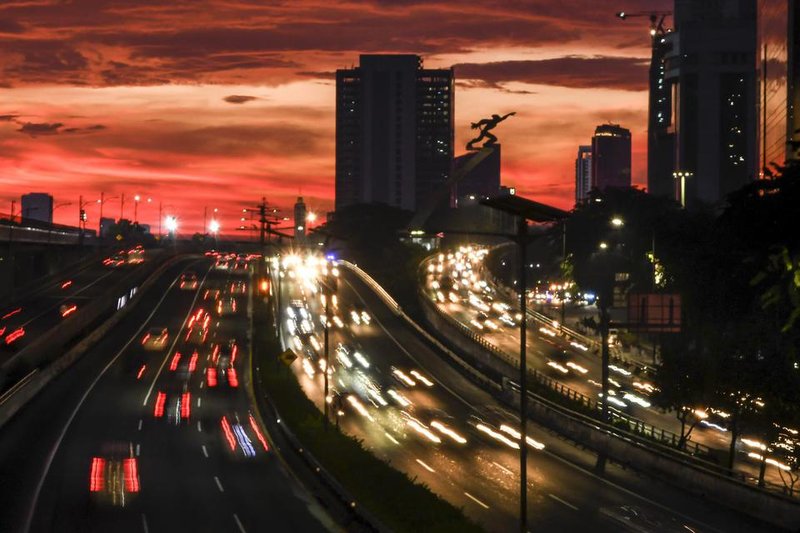 freeway traffic at sunset
